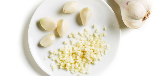 Knoflook persen of snijden
